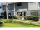 Townhouse complex showcases well-maintained lawns, landscaping and pedestrian walkways at 2551 W Berridge Ln # D6, Phoenix, AZ 85017