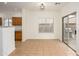 Bright dining area featuring tile floors and access to the outdoor patio and kitchen at 2560 E Indian Wells Pl, Chandler, AZ 85249