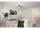 Spacious living room with modern decor, a stylish rug, and neutral toned walls at 2560 E Indian Wells Pl, Chandler, AZ 85249