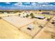 Expansive horse riding arena and outbuildings offering plenty of room to ride and train your horses at 27662 N Desert Sky Rd, Florence, AZ 85132