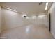 Finished bonus room with neutral paint, tile floor and bright lighting at 3125 E Grovers Ave, Phoenix, AZ 85032