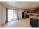 Bright kitchen featuring stainless steel appliances and sliding glass doors to the backyard at 3125 E Grovers Ave, Phoenix, AZ 85032