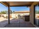 Covered outdoor kitchen area with stainless steel grill at 33224 N Cat Hills Ave, San Tan Valley, AZ 85144