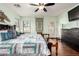 Inviting bedroom with stylish decor, wood-look tile flooring and plenty of space at 33224 N Cat Hills Ave, San Tan Valley, AZ 85144
