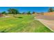 Open green space and landscaping create an inviting park and playground at 33224 N Cat Hills Ave, San Tan Valley, AZ 85144