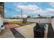 A fully fenced backyard with a trampoline, perfect for Gathering fun at 3520 E Ludlow Dr, Phoenix, AZ 85032