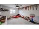 A bedroom with sports pennants and car bed at 3520 E Ludlow Dr, Phoenix, AZ 85032