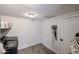 Spacious laundry room features tile floors and ample storage at 3520 E Ludlow Dr, Phoenix, AZ 85032