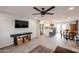 Inviting open-concept living area showcasing a modern kitchen and comfortable living room at 3520 E Ludlow Dr, Phoenix, AZ 85032