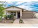 Charming single-story home featuring a manicured front yard, covered entry, and two-car garage at 3839 E Dublin St, Gilbert, AZ 85295