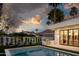 Beautiful backyard oasis with pool, grill, and lounge chairs against a scenic dusk sky. Landscaped for privacy at 4120 N 44Th Pl, Phoenix, AZ 85018