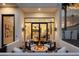 Inviting outdoor firepit area with modern seating and views of the home's interior at 4120 N 44Th Pl, Phoenix, AZ 85018