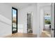Bright hallway features an open doorway to a shower and a large window showcasing a view at 4120 N 44Th Pl, Phoenix, AZ 85018