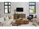 Comfortable living area with stylish furniture, wood accents, and natural light at 4120 N 44Th Pl, Phoenix, AZ 85018