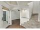 Bright entryway features brick floors, staircase, light fixture, and seamless transition to living spaces at 4225 N 21St St # 22, Phoenix, AZ 85016
