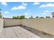 Rooftop patio space with a distant view of the surrounding trees and skyline at 4225 N 21St St # 22, Phoenix, AZ 85016