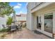 Enclosed patio includes stone flooring and a shady spot for relaxing and dining al fresco at 4225 N 21St St # 22, Phoenix, AZ 85016