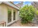 Private patio area with stone tiling and french doors, perfect for indoor-outdoor living at 4225 N 21St St # 22, Phoenix, AZ 85016