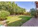 Lush backyard featuring a grassy area and mature landscaping for privacy and tranquility at 4714 E Angela Dr, Phoenix, AZ 85032