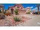 Charming two-story home featuring desert landscaping and a private two-car garage at 4714 E Angela Dr, Phoenix, AZ 85032