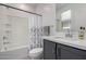 The full bathroom offers a shower-tub combo and single sink vanity at 5383 N 205Th Dr, Buckeye, AZ 85396