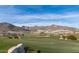 Spectacular golf course view of rolling hillsides and mountains at 5383 N 205Th Dr, Buckeye, AZ 85396