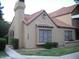 Charming single-story home featuring a red tile roof, stucco siding and a well-maintained front yard at 5704 E Aire Libre Ave # 1036, Scottsdale, AZ 85254