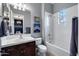 Bathroom featuring a shower-tub combination, vanity, and decorative accents at 5829 W Alyssa Ln, Phoenix, AZ 85083