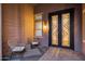 Front door patio featuring comfortable seating and unique door at 5829 W Alyssa Ln, Phoenix, AZ 85083