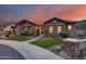 Beautiful one-story home featuring stone accents, manicured lawn, and well-kept desert landscaping at 5829 W Alyssa Ln, Phoenix, AZ 85083