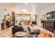 Open concept living room featuring neutral walls, tile flooring and easy access to kitchen at 6314 N 14Th Pl, Phoenix, AZ 85014