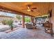Covered patio with fans, water fountain and outdoor seating, ideal for entertaining at 6314 N 14Th Pl, Phoenix, AZ 85014