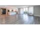 Spacious open-concept living area with a view into the modern kitchen at 6502 N Central Ave # A103, Phoenix, AZ 85012