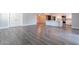 Expansive living space with hardwood flooring and an open layout at 6502 N Central Ave # A103, Phoenix, AZ 85012