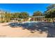Inviting outdoor pool area surrounded by lush landscaping and lounge chairs, ideal for relaxation and recreation at 6502 N Central Ave # A103, Phoenix, AZ 85012