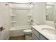 Bathroom featuring a shower-tub combo, white vanity, and modern fixtures at 7701 W Avenida Del Rey --, Peoria, AZ 85383