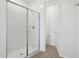 Walk-in shower with sleek glass door in a bathroom with tile flooring at 7701 W Avenida Del Rey --, Peoria, AZ 85383