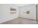 Bedroom with tile floors and two windows at 7701 W Avenida Del Rey --, Peoria, AZ 85383