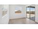 Bedroom with tile floors, and a sliding glass door to patio at 7701 W Avenida Del Rey --, Peoria, AZ 85383