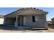 Charming single-Gathering home featuring a stucco exterior, covered porch, and attached garage for modern living at 7701 W Avenida Del Rey --, Peoria, AZ 85383