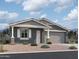 Charming single-story home with a two-car garage, neutral color palette and low-maintenance desert landscaping at 7701 W Avenida Del Rey --, Peoria, AZ 85383