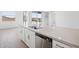 Bright kitchen featuring quartz countertops, stainless appliances, and tile flooring at 7701 W Avenida Del Rey --, Peoria, AZ 85383