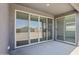 Covered patio with sliding glass doors leading to the backyard at 7701 W Avenida Del Rey --, Peoria, AZ 85383