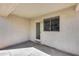Back patio with concrete floor, exterior door, and window, providing a nice outdoor space at 849 E Impreria St, San Tan Valley, AZ 85140