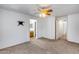 Bedroom featuring light-colored carpet and a wall mount for the TV at 849 E Impreria St, San Tan Valley, AZ 85140