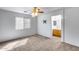 Bedroom with light-colored carpet and a wall mount for the TV at 849 E Impreria St, San Tan Valley, AZ 85140