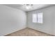 Bedroom featuring carpet flooring, white walls, and a window at 849 E Impreria St, San Tan Valley, AZ 85140