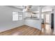 Dining area with wood-look flooring, an open layout, and ample natural light at 849 E Impreria St, San Tan Valley, AZ 85140