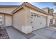 Close-up of the home's garage and front door area with easy access and comfortable appeal at 849 E Impreria St, San Tan Valley, AZ 85140