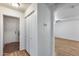 Hallway with closet, leading to living room and laundry area at 849 E Impreria St, San Tan Valley, AZ 85140